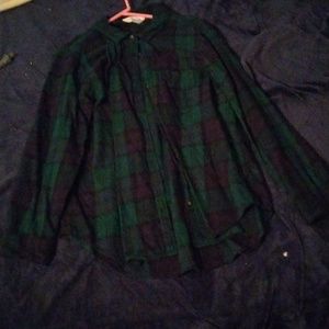 A butten down long sleeve shirt